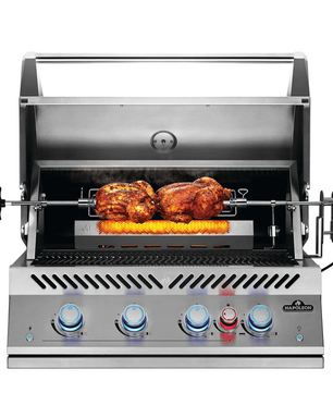 Stainless steel grill with rotisserie system on a white background