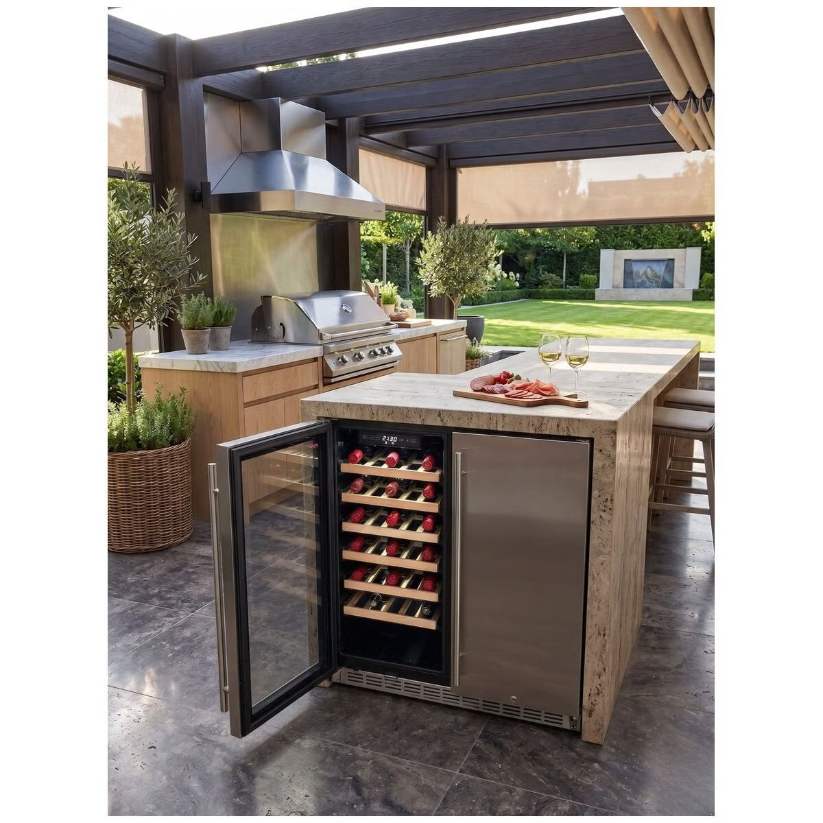 A stainless steel outdoor island wine refrigerator with a glass door, shown open with wine bottles inside, set in a modern patio kitchen environment.