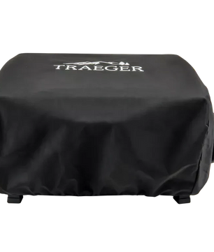 Black grill cover with Traeger logo on a white background