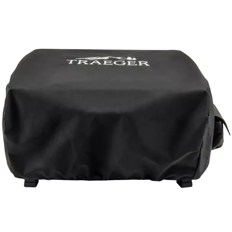 Black grill cover with Traeger logo on a white background