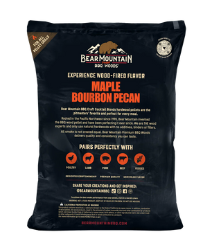 A large black bag of Bear Mountain BBQ Wood Co. Maple Bourbon Pecan hardwood pellets, showing the back of the packaging with product details, flavor text, pairing icons, and a circular seal.
