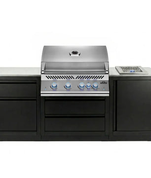 Stainless steel outdoor grill with black cabinets on a white background