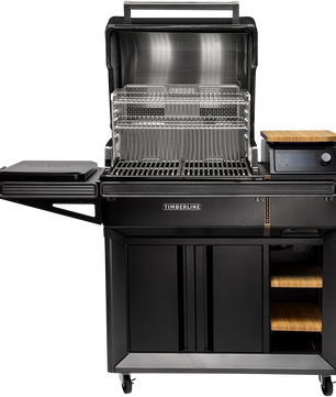 Black outdoor grill with additional shelves and a cutting board on a white background