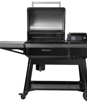 Black grill with digital display on a white background
