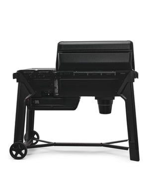 Black portable grill on a white background