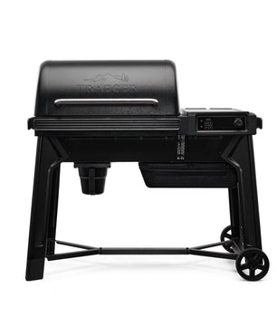 Black Traeger grill on a white background