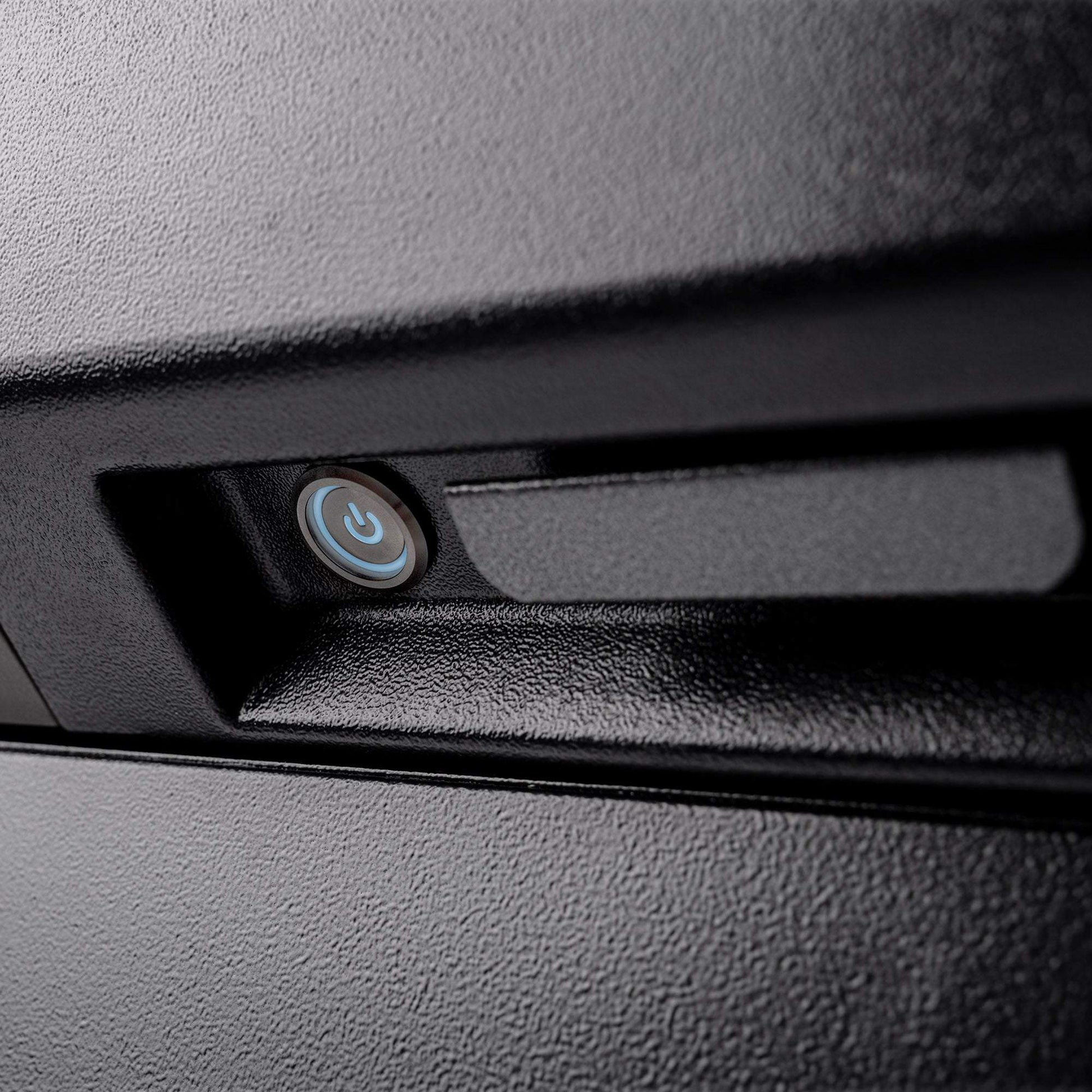 Car interior with a power window switch on the dashboard