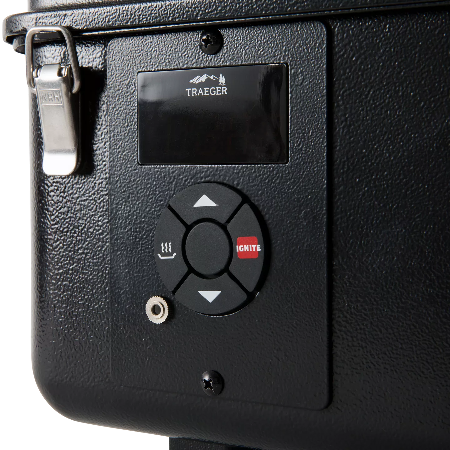 Control panel with Traeger logo on a black surface
