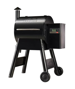 Black Traeger grill on a white background