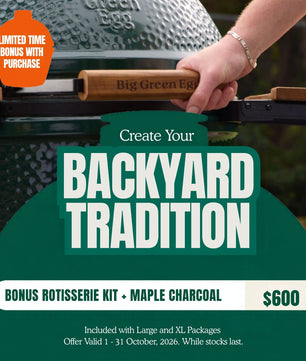 Promotional graphic for a Big Green Egg grill offering a bonus rotisserie kit with maple charcoal. A hand is shown holding the wooden egg lifter on a dark green ceramic grill.