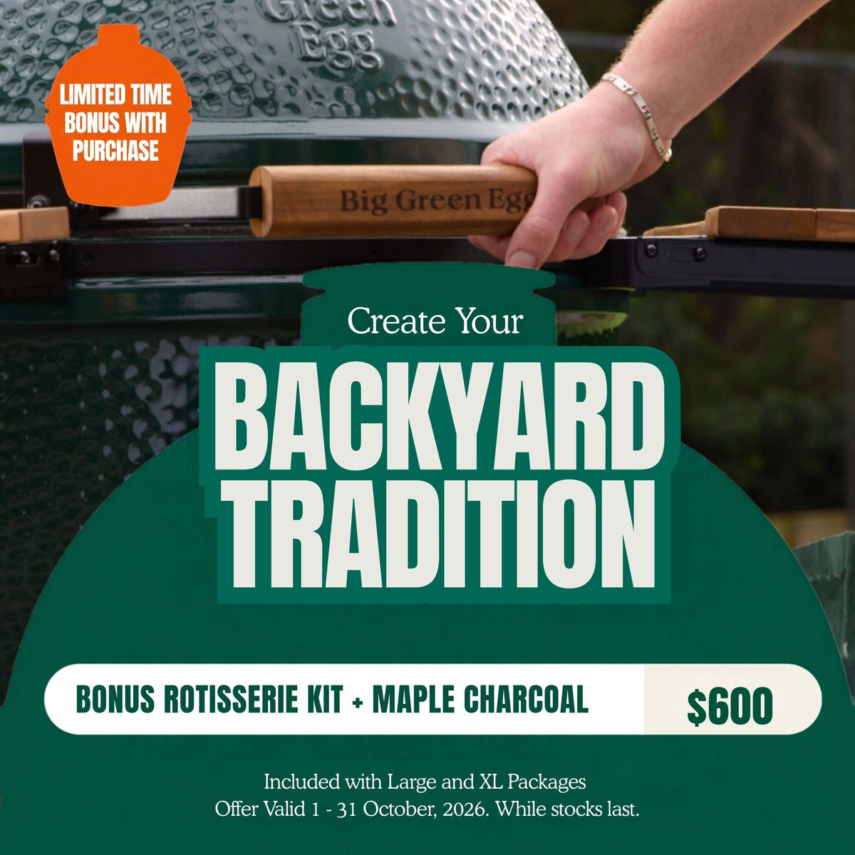 Promotional graphic for a Big Green Egg grill offering a bonus rotisserie kit with maple charcoal. A hand is shown holding the wooden egg lifter on a dark green ceramic grill.