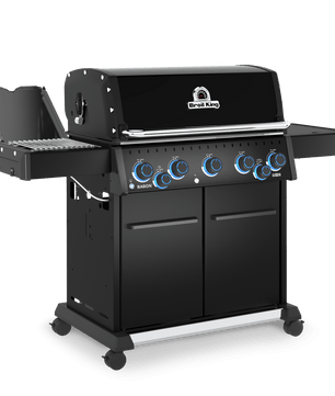 Black barbecue grill with multiple burners on a white background