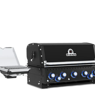 A black outdoor gas grill with a side attachment table, shown on a solid white background. The grill features a black lid with a chrome handle, a chrome control panel with blue accents, and a white 'Grill Monkey' logo on the front.