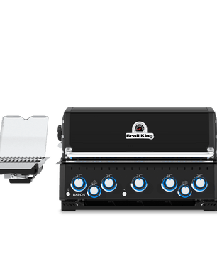 A black outdoor gas grill with five blue control knobs on the front, shown alongside a matching black side table with a clear glass lid on a white background.
