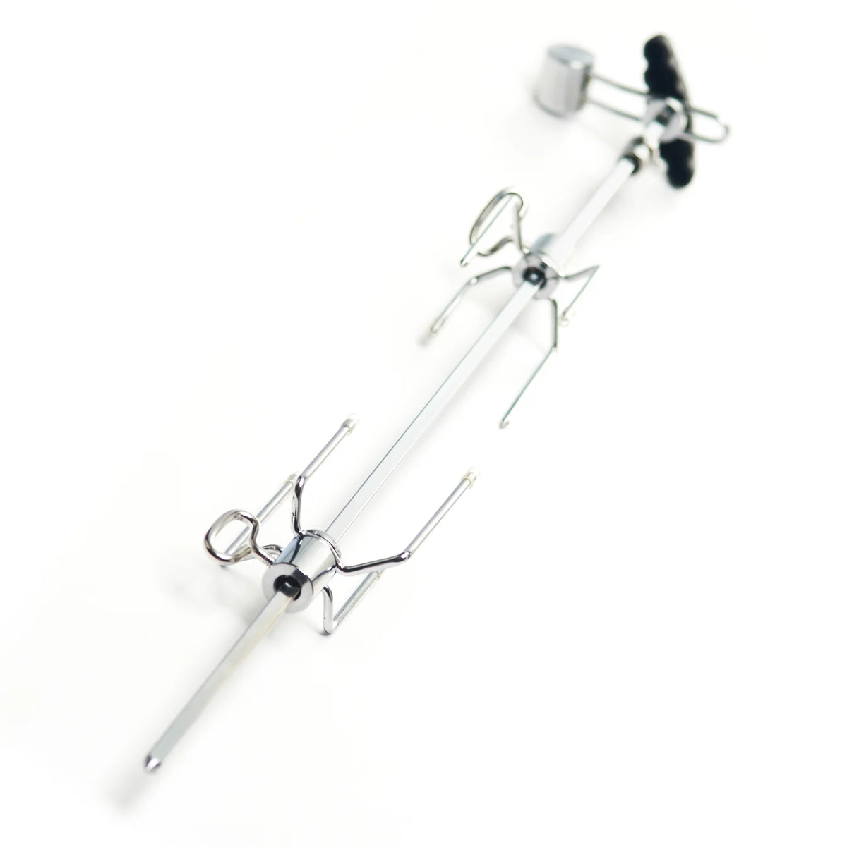 A metal spider-themed tool or accessory with a long silver rod, two spider-shaped wire arms, and a black knob, photographed on a plain white background.