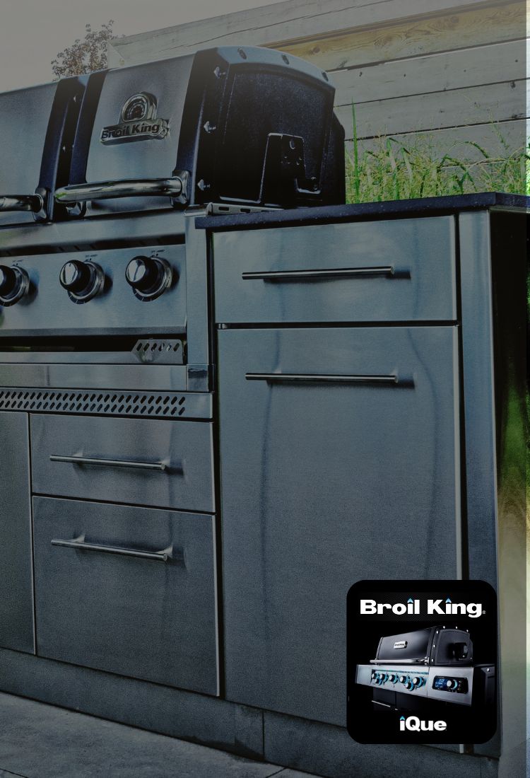 Broil King barbecue grill with multiple drawers and a visible brand logo.