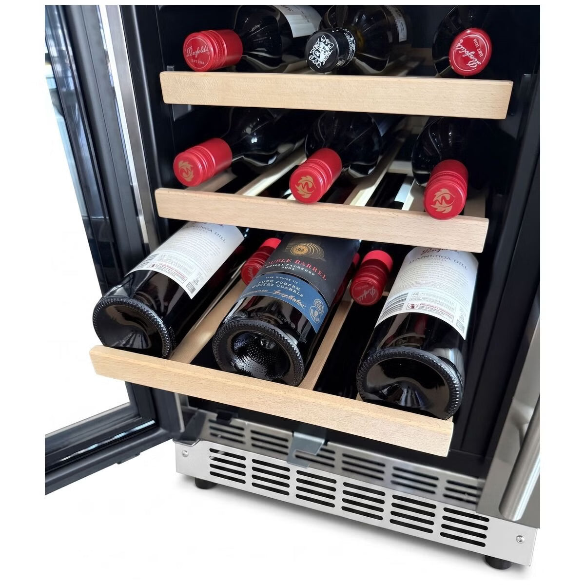 A wine cooler with a black interior and light wood shelves, stocked with wine bottles. The cooler door is open, showing the interior layout and a stainless steel vented base against a white background.