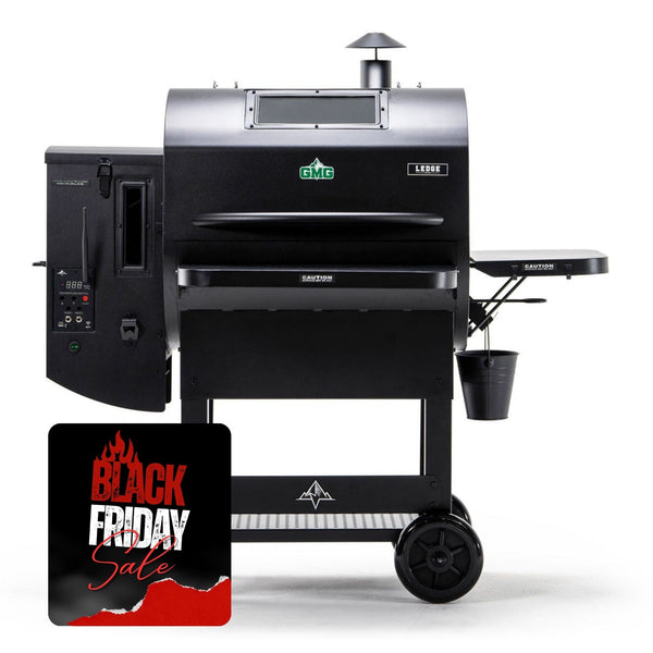 Black barbecue grill with a 'Black Friday Sale' sign in the foreground on a white background