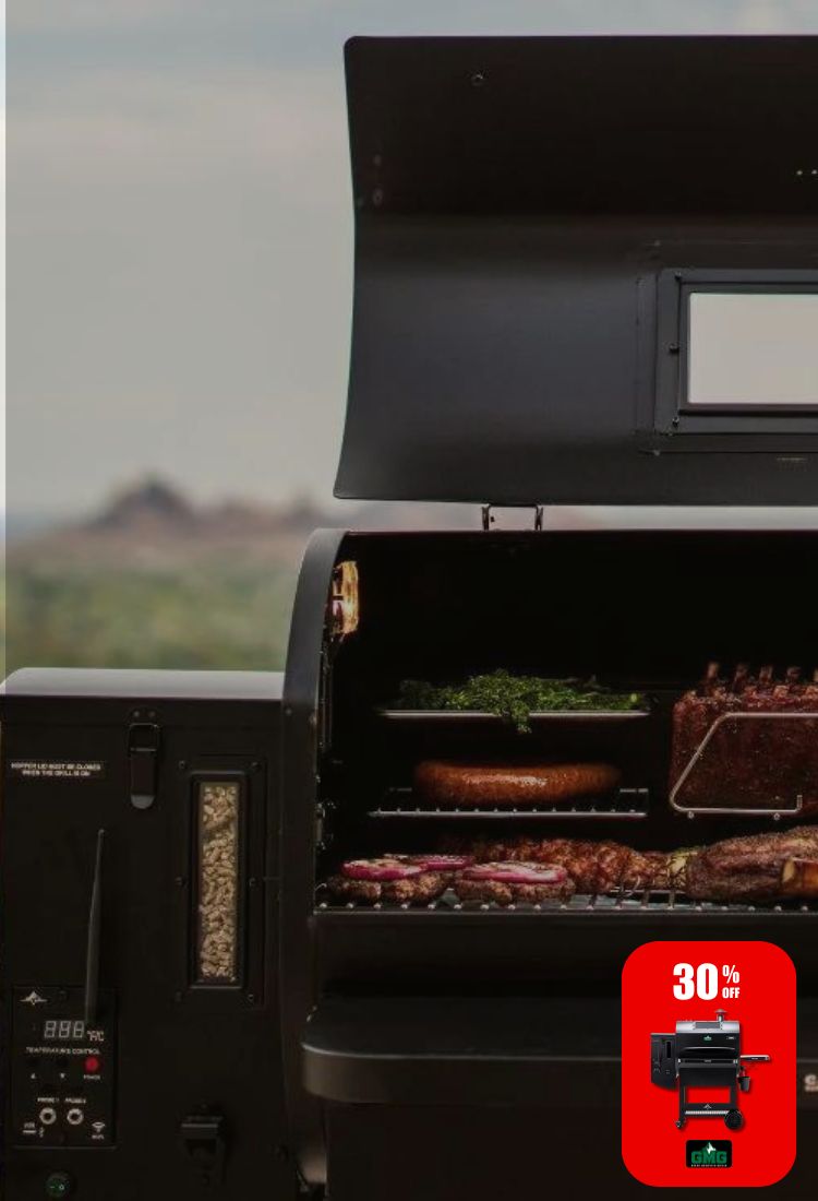 GMG Ledge Prime grilling beef and sauages with mountains in the background