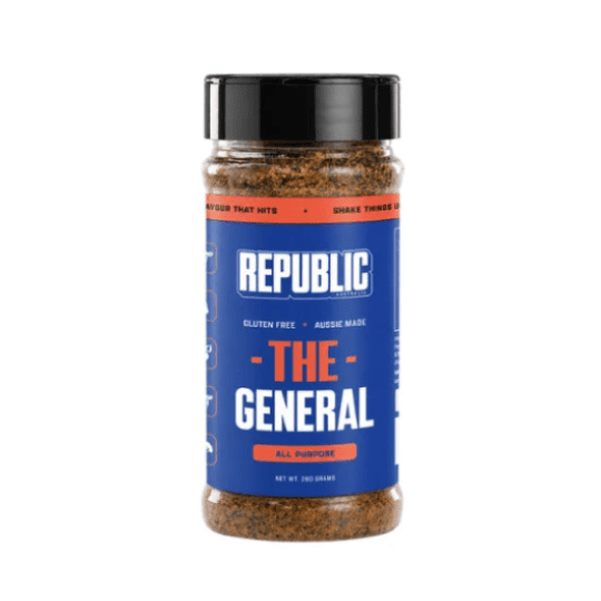 A bottle of Republic Seasoning 'The General' all purpose spice blend, featuring a blue label with white and orange text and a black lid, on a white background.