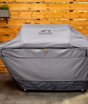 Traeger grill cover on a wooden deck