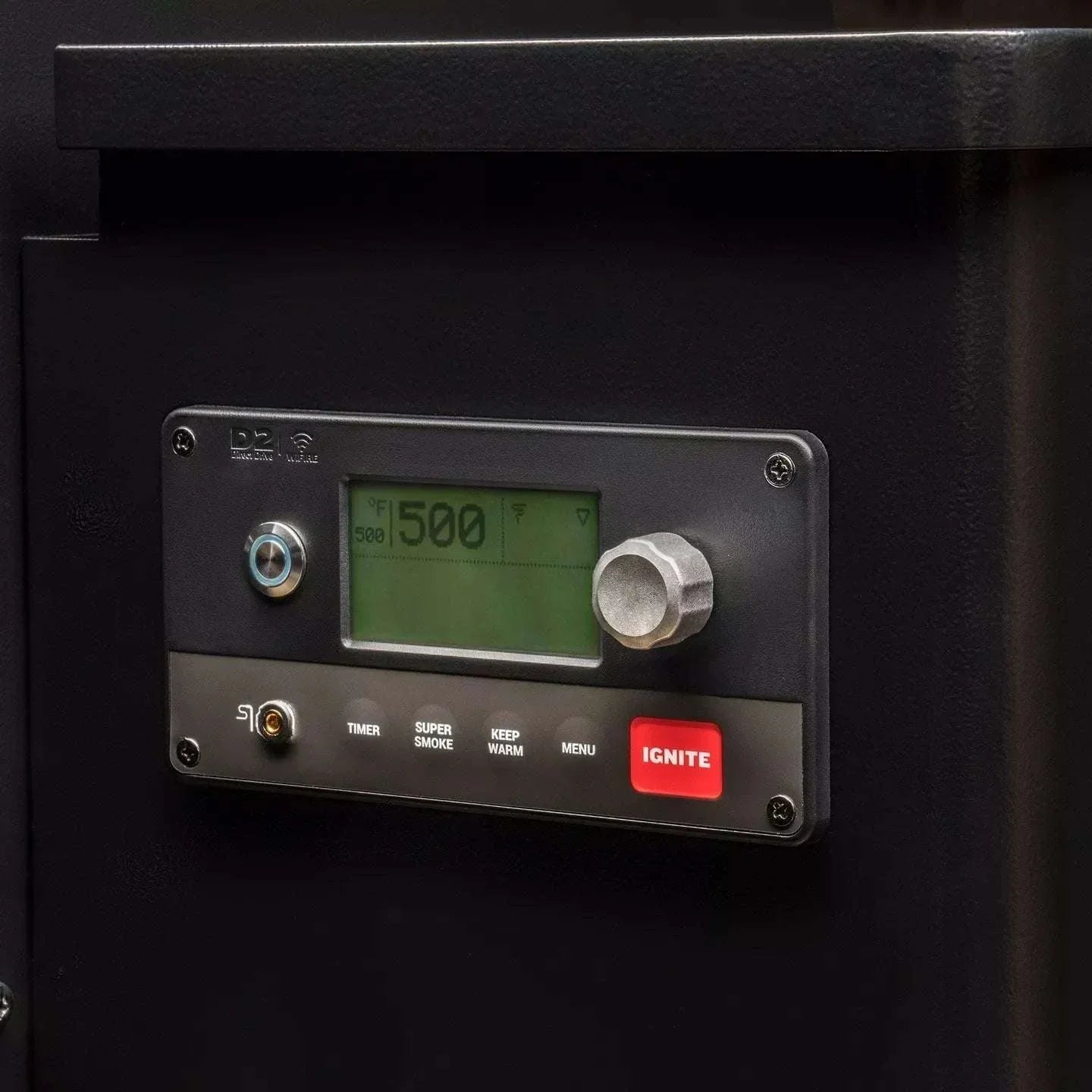 Control panel with digital display and buttons on a black background