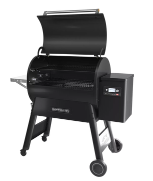 Black grill with digital display on a white background