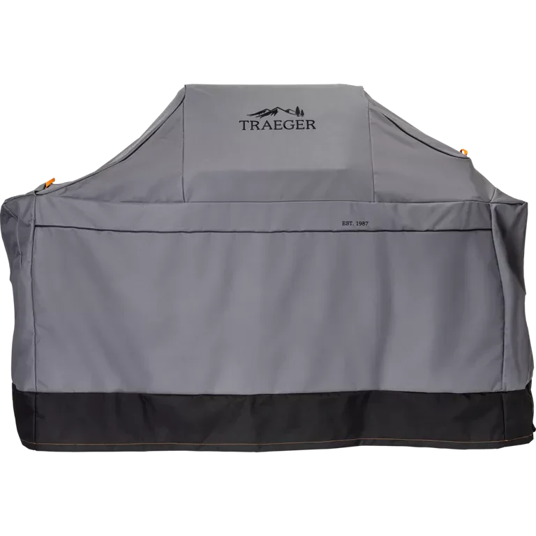 Gray Traeger grill cover on a white background