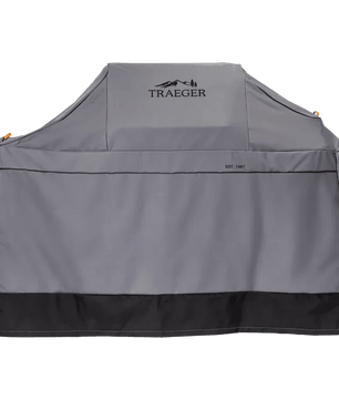 Gray Traeger grill cover on a white background