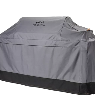 Gray grill cover with Traeger logo on a white background