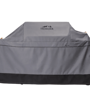 Gray grill cover with Traeger logo on a white background