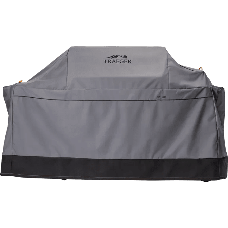 Gray grill cover with Traeger logo on a white background