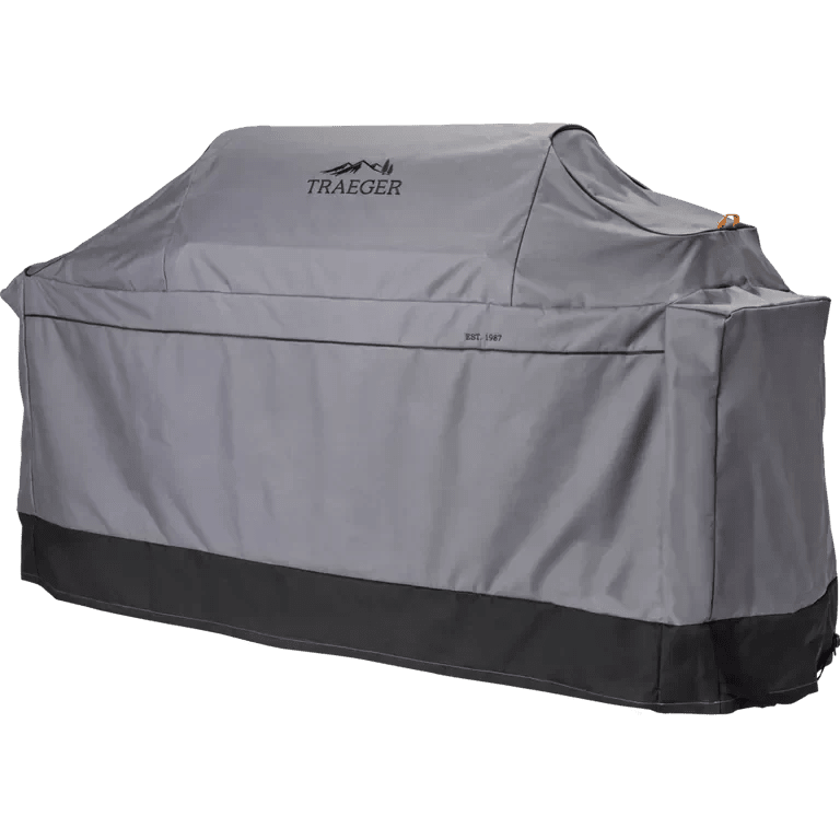 Gray grill cover with Traeger logo on a white background