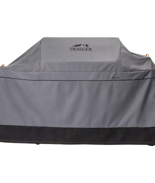 Gray grill cover with Traeger logo on a white background