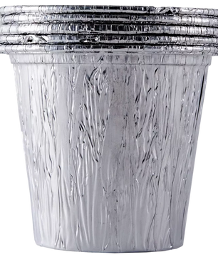 Stack of clear plastic containers with silver lids on a white background