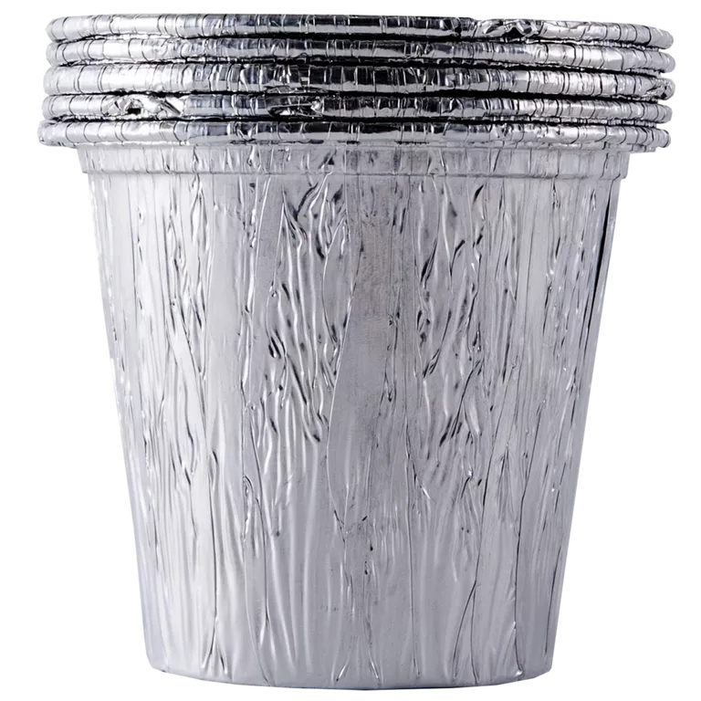 Stack of clear plastic containers with silver lids on a white background