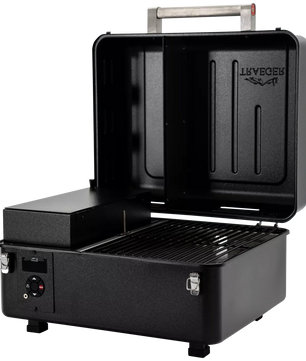 Black portable grill with open lid on a white background