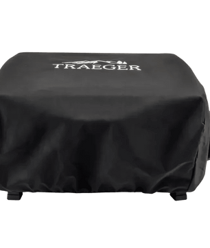 Black grill cover with Traeger logo on a white background
