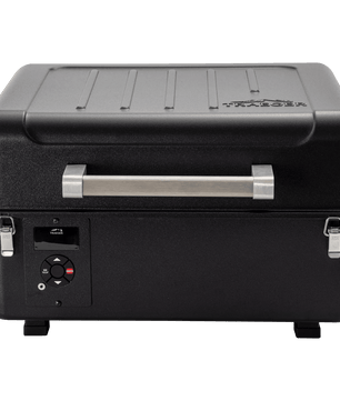 Black portable cooler with a handle on a white background