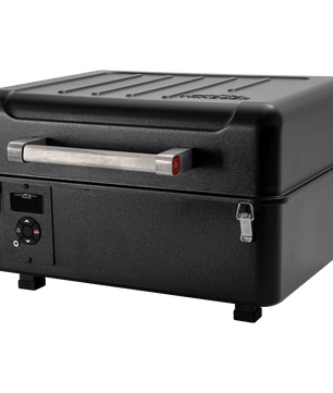 Black portable grill on a white background