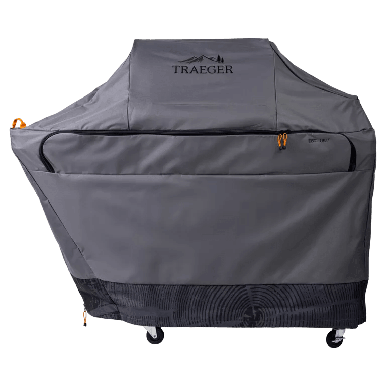Gray grill cover with Traeger logo on a white background