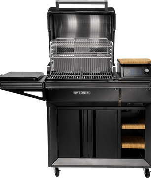Black outdoor grill with additional shelves and a cutting board on a white background