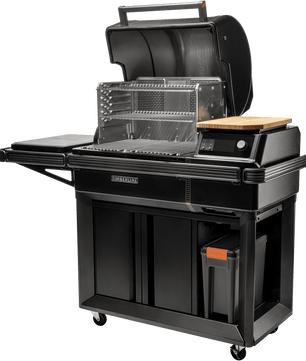 Black outdoor grill with various accessories on a white background