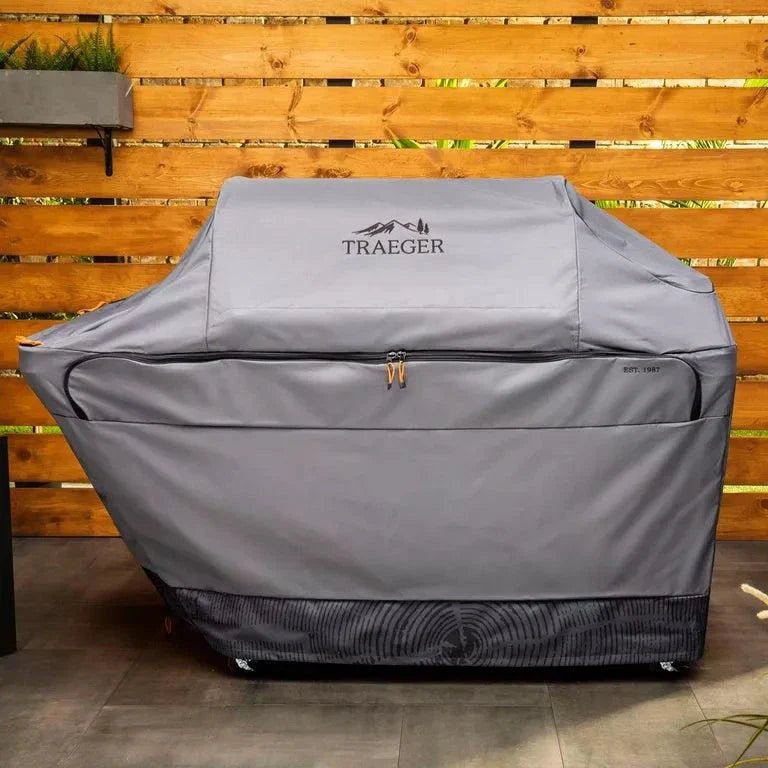 Traeger grill cover on a wooden deck