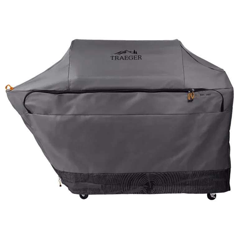 Gray grill cover with Traeger logo on a white background