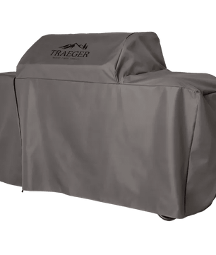 Gray grill cover with Traeger logo on a white background