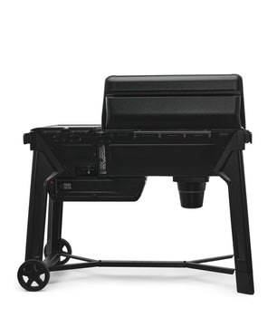 Black portable grill on a white background